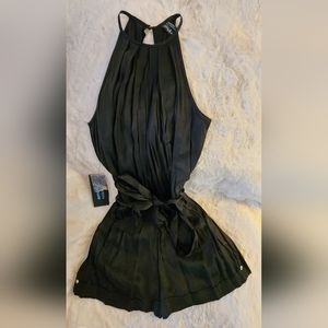 Guess by Marciano. Romper. Black. W/price tag. Size Small/4. Never worn.